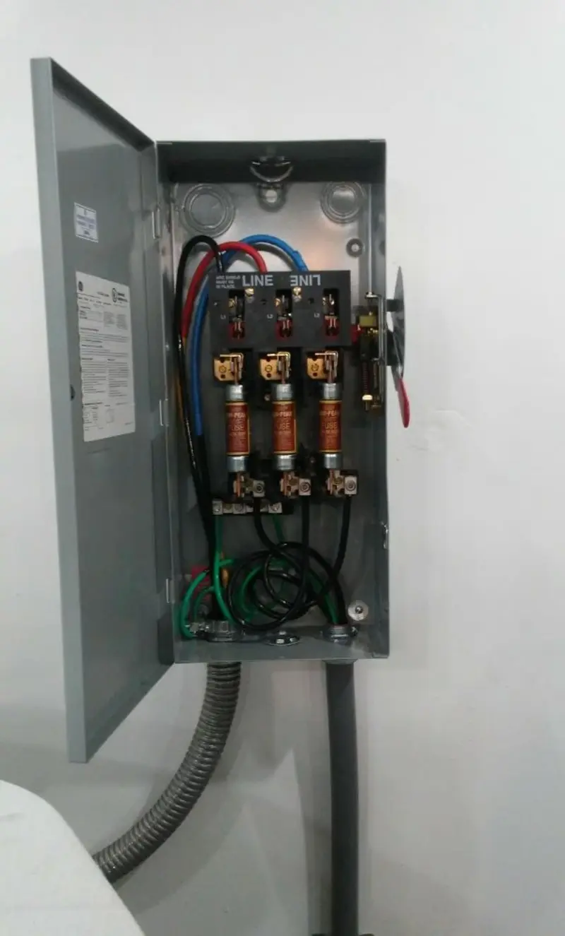Three-phase disconnect switch installed for Electrical Wiring & Rewiring in Arab